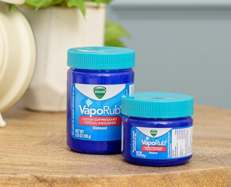 Two jars of VapoRub on a table